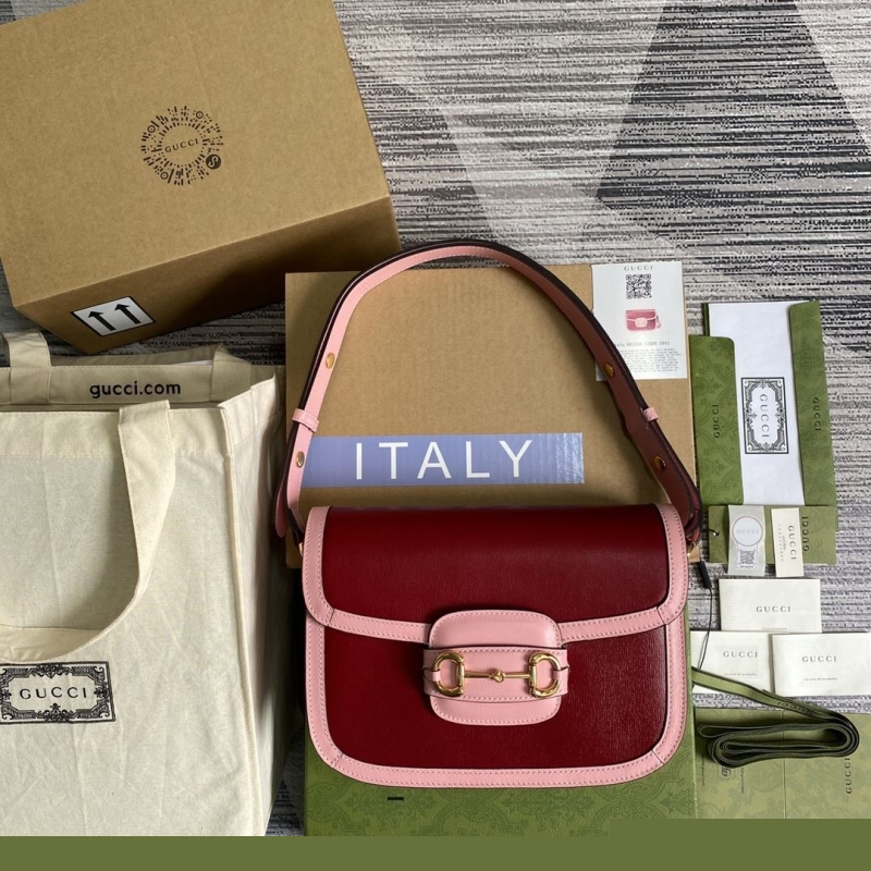 G*u*i top handle bags